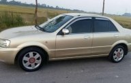 Ford Laser  1.8MT 2003 - Cần bán Ford Laser 1.8MT năm 2003, màu vàng chính chủ giá cạnh tranh giá 185 triệu tại Nghệ An