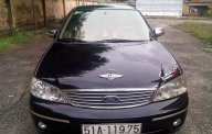 Ford Laser GHIA 2004 - Bán Ford Laser GHIA 2004, màu đen chính chủ, giá 242tr giá 242 triệu tại Tp.HCM