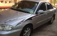 Kia Spectra 2004 - Bán ô tô Kia Spectra đời 2004, màu bạc giá 140 triệu tại Tiền Giang