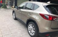 Mazda CX 5 2.0AT 2014 - Bán Mazda CX 5 2.0AT năm sản xuất 2014, màu vàng cát giá 735 triệu tại Thái Nguyên
