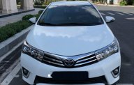 Toyota Corolla altis 1.8 G 2015 - Bán xe Toyota Corolla altis 1.8 G đời 2015, màu trắng số tự động giá 660 triệu tại Hậu Giang