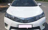 Toyota Corolla altis  1.8 G 2015 - Bán Toyota Corolla Altis 1.8 G sản xuất năm 2015, màu trắng giá 660 triệu tại Hậu Giang