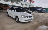 Daewoo Lacetti EX 1.6 MT 2005 - Cần bán xe Daewoo Lacetti EX 1.6 MT đời 2005, màu trắng giá 138 triệu tại Ninh Thuận