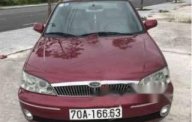 Ford Laser Ghia 2003 - Bán xe Ford Laser Ghia sản xuất 2003, màu đỏ, giá chỉ 225 triệu giá 225 triệu tại Tây Ninh