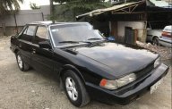 Mazda 626 1986 - Cần bán gấp Mazda 626 đời 1986, màu đen, xe nhập còn mới giá 35 triệu tại Tp.HCM