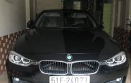BMW 3 Series  328I 2014 - Chính chủ bán BMW 3 Series 328I đời 2014, màu đen, nhập khẩu giá 1 tỷ 300 tr tại Tp.HCM