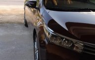 Toyota Corolla altis 1.8G MT 2015 - Bán Toyota Corolla altis 1.8G MT đời 2015, màu nâu, đẹp như mới giá 580 triệu tại Vĩnh Phúc