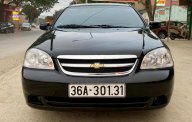 Chevrolet Lacetti EX 2012 - Bán ô tô Chevrolet Lacetti EX sản xuất 2012, màu đen giá 285 triệu tại Thanh Hóa