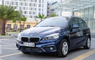 BMW 2 Series 218i Active 2015 - Cần bán xe BMW 2 Series 218i Active sản xuất 2015, xe gia đình, lanh lẹ gọn gàng, cốp rộng rãi giá 930 triệu tại Tp.HCM