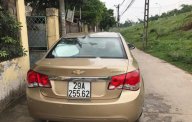 Chevrolet Cruze LS 2010 - Bán xe Chevrolet Cruze LS sản xuất 2010, màu vàng số sàn giá 295 triệu tại Hà Nội