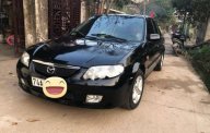 Mazda 323 2002 - Bán Mazda 323 đời 2002, màu đen, nhập khẩu   giá 180 triệu tại Quảng Trị