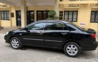 Bán xe Corolla Altis đời 2005 màu đen, số sàn, xe công chức sử dụng đi rất ít và giữ gìn giá 310 triệu tại Hà Nội
