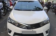 Toyota Corolla altis MT 2015 - Gia đình cần bán xe Altis 2015, số sàn, màu trắng, gia đình sử dụng giá 574 triệu tại Tp.HCM