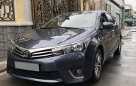 Toyota Corolla altis MT 2015 - Bán Toyota Altis 2015 số sàn, màu xanh rất đẹp giá 565 triệu tại Tp.HCM