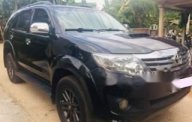 Toyota Fortuner G 2013 - Bán lại xe Toyota Fortuner G năm sản xuất 2013, màu đen giá 690 triệu tại TT - Huế