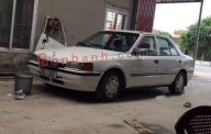 Mazda 323 MT 1997 - Cần bán Mazda 323 MT đời 1997, màu trắng giá 35 triệu tại Ninh Bình