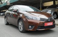 Toyota Corolla altis 1.8AT  2014 - Cần bán xe Toyota Corolla altis sản xuất năm 2014, màu nâu giá 605 triệu tại Hà Nội