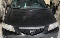 Mazda Premacy   2003 - Cần bán Mazda Premacy năm sản xuất 2003, màu đen, xe gia đình sử dụng giá 230 triệu tại Bình Dương