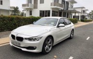 BMW 3 Series  320i 2014 - Cần bán xe BMW 3 Series 320i năm sản xuất 2014, màu trắng, giá chỉ 860 triệu giá 860 triệu tại Tp.HCM