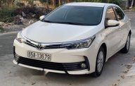 Toyota Corolla altis 2018 - Lên đời bán xe Toyota Corolla altis năm 2018, màu trắng giá 650 triệu tại Cần Thơ