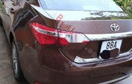 Chính chủ bán xe Toyota Corolla altis 1.8G AT năm sản xuất 2015, màu nâu giá 620 triệu tại Vĩnh Phúc
