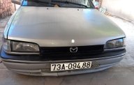 Mazda 323  1.6MT  1995 - Cần bán xe Mazda 323 1.6MT đời 1995, màu bạc, nội thất đẹp chính chủ giá 45 triệu tại Quảng Bình