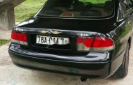 Mazda 626 1996 - Cần bán lại xe Mazda 626 sản xuất 1996, màu đen, xe nhập giá 115 triệu tại Phú Yên