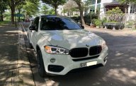 BMW X6     2014 - Cần bán xe BMW X6 đời 2014, màu trắng, nhập khẩu nguyên chiếc xe gia đình giá 2 tỷ 100 tr tại Tp.HCM