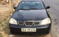 Daewoo Lacetti 2004 - Cần bán lại xe Daewoo Lacetti sản xuất năm 2004, màu đen giá 115 triệu tại Yên Bái