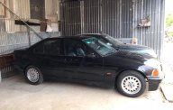 BMW 3 Series 320i 1996 - Bán BMW 3 Series 320i đời 1996, màu đen, xe nhập còn mới, 105 triệu giá 105 triệu tại Tp.HCM