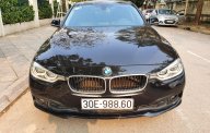 BMW 3 Series   2016 - Bán gấp chiếc BMW 3 Series 320i, màu đen, nhập khẩu nguyên chiếc, giá rẻ giá 920 triệu tại Hà Nội