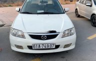 Mazda 323F 2004 - Cần bán gấp Mazda 323F GLX đời 2004, màu trắng giá 145 triệu tại Bình Dương