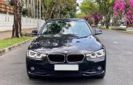BMW 3 Series 2016 - Cần bán BMW 3 Series 320i sản xuất năm 2016, màu đen giá 1 tỷ 39 tr tại Tp.HCM