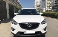 Mazda CX 5  AT   2015 - Bán xe Mazda CX 5 AT đời 2015, màu trắng xe gia đình giá 666 triệu tại Tp.HCM
