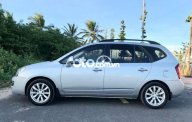 Kia Carens   EX 2.0   2010 - Bán Kia Carens EX 2.0 năm 2010, màu bạc xe gia đình  giá 228 triệu tại Tiền Giang