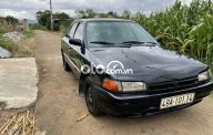 Mazda 323 1995 - Cần bán lại xe Mazda 323 năm sản xuất 1995, màu đen, nhập khẩu giá 36 triệu tại Đắk Lắk