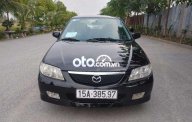 Cần bán lại xe Mazda 323 sản xuất năm 2004, màu đen, giá 150tr giá 150 triệu tại Hải Phòng