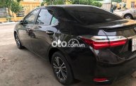 Toyota Corolla   2019 - Bán ô tô Toyota Corolla đời 2019, màu đen giá 620 triệu tại Tp.HCM