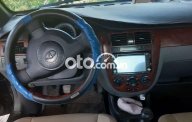 Daewoo Lacetti MT 2009 - Bán Daewoo Lacetti MT năm sản xuất 2009, màu đen giá cạnh tranh giá 130 triệu tại Quảng Bình