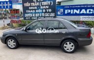 Ford Laser 2002 - Cần bán Ford Laser năm sản xuất 2002, màu xám giá 125 triệu tại Tiền Giang