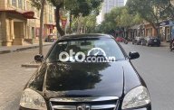 Daewoo Lacetti   EX 2010 - Cần bán Daewoo Lacetti EX sản xuất năm 2010, màu đen số sàn, giá 150tr giá 150 triệu tại Hà Nội