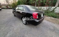 Daewoo Lacetti EX 2010 - Cần bán Daewoo Lacetti EX năm sản xuất 2010, màu đen giá 155 triệu tại Quảng Ninh