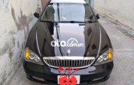 Daewoo Magnus 2004 - Cần bán lại xe Daewoo Magnus năm 2004, màu đen, giá 180tr giá 180 triệu tại Tiền Giang