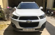 Chevrolet Captiva AT 2014 - Cần bán Chevrolet Captiva Revv số tự động, màu trắng, xe sản xuất và đăng ký lần đầu 2014 giá 450 triệu tại Tp.HCM