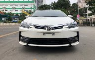 Toyota Corolla 2019 - Cần bán lại xe Toyota Corolla Altis sản xuất 2019, màu trắng, giá tốt giá 598 triệu tại Hà Nội