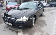 Mazda 626 MT 2003 - Bán xe Mazda 626 MT năm 2003, màu đen, nhập khẩu giá 145 triệu tại Hà Nội