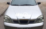 Daewoo Lacetti SE 2004 - Cần bán Daewoo Lacetti SE sản xuất năm 2004, màu bạc giá cạnh tranh giá 96 triệu tại Hà Nội
