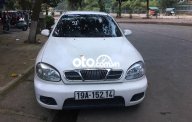 Daewoo Lanos MT 2005 - Bán Daewoo Lanos MT sản xuất năm 2005, màu trắng giá cạnh tranh giá 55 triệu tại Lào Cai