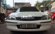 Ford Laser    1.6  1999 - Cần bán lại xe Ford Laser 1.6 năm 1999, màu trắng, nhập khẩu, 155 triệu giá 155 triệu tại Tp.HCM