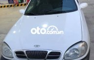 Daewoo Lanos  MT 2003 - Xe Daewoo Lanos MT năm 2003, màu trắng giá 65 triệu tại Trà Vinh